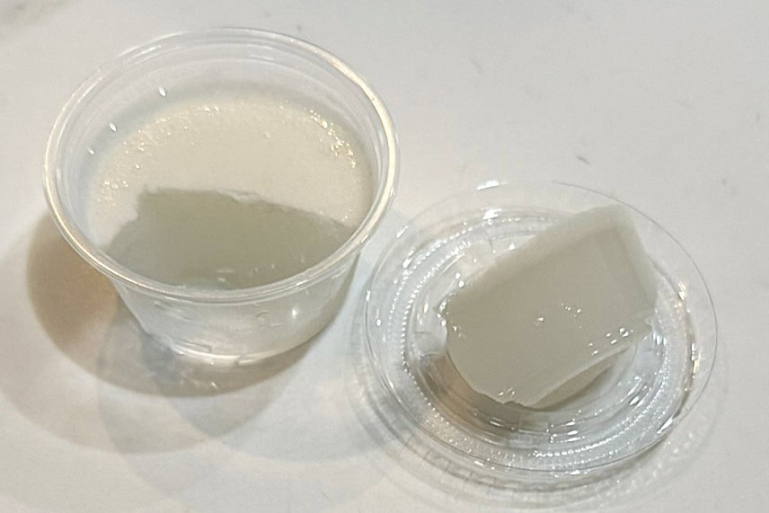 A very thin layer of coconut on the top of the jello shot