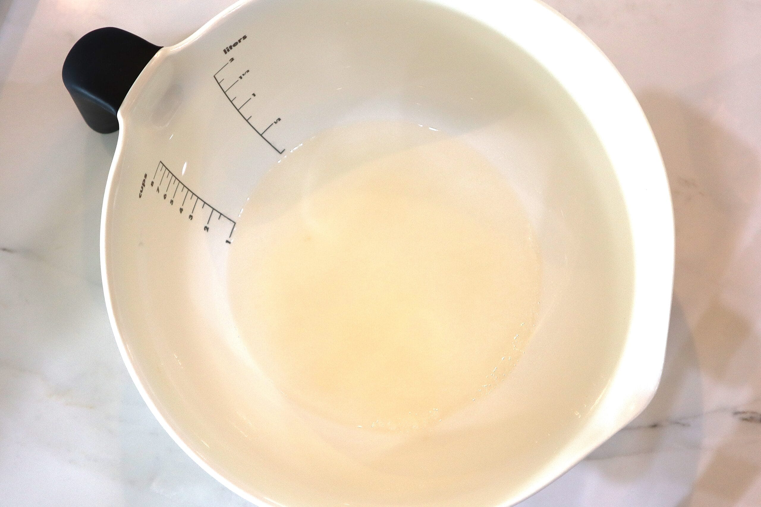 Gelatin soaking in vodka and water