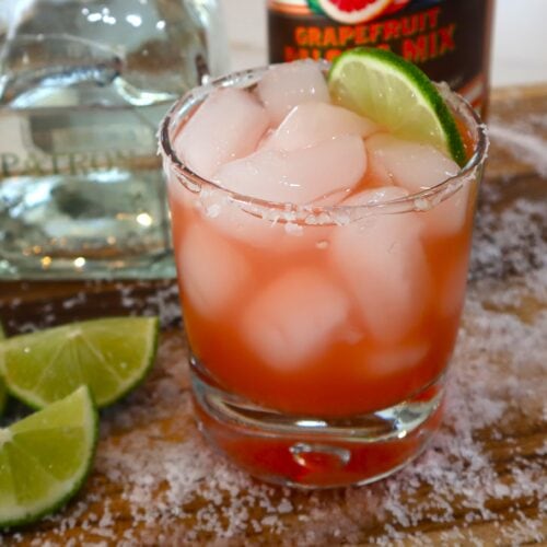 Paloma Margarita with Tequila, mixer, and limes