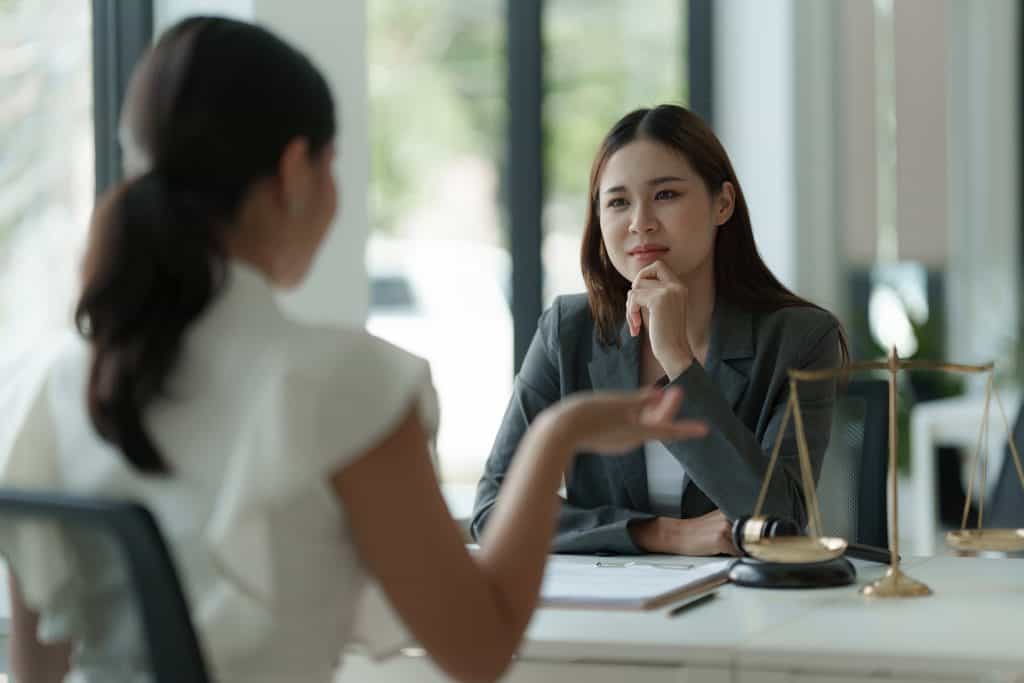 business woman and lawyers discussing contract pap 2022 09 19 20 31 16 utc min