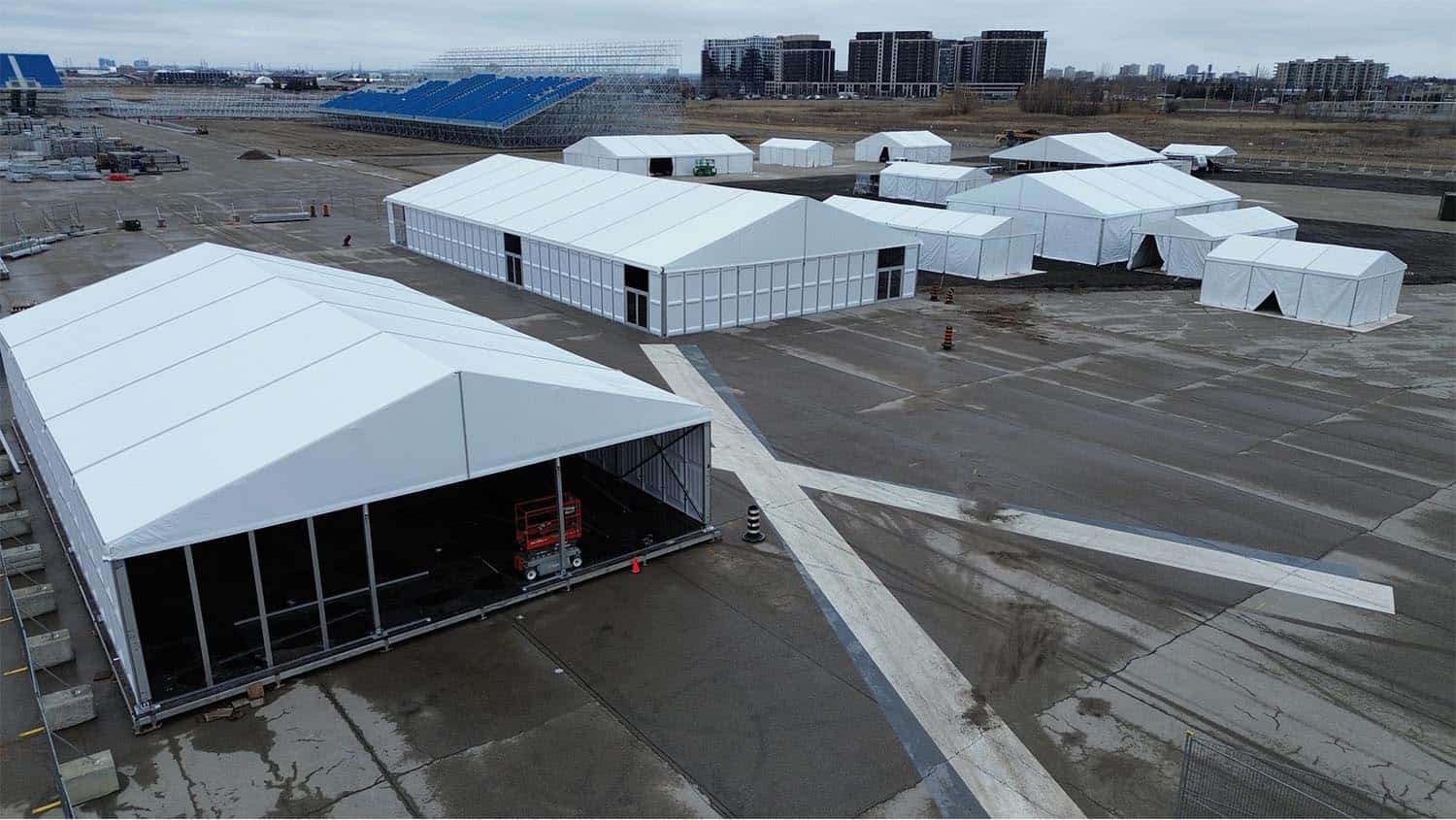 Temporary event tents setup at EJH Distribution facility, offering versatile space for logistics and events, with modern infrastructure and convenient access for efficient distribution operations.