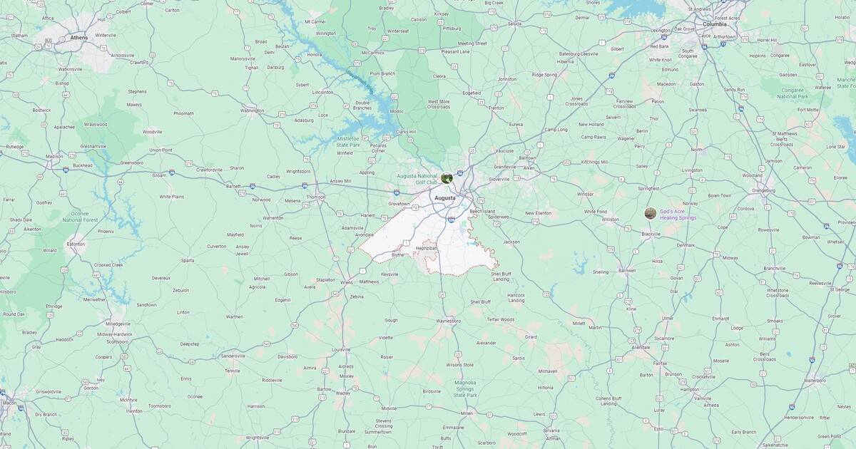 Augusta golf course with lush green fairways, scenic views, and a tranquil atmosphere in Georgia.