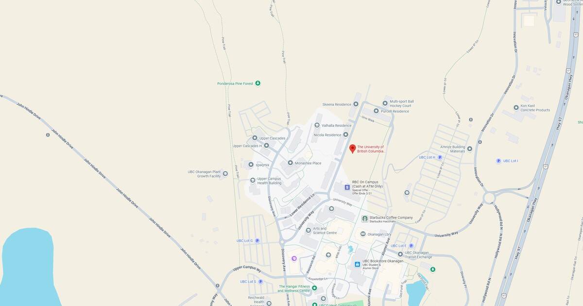 A map of a lakeside town showing streets, landmarks, and natural features, including a lake, parks, and residential areas.