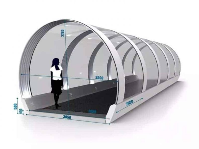 High-tech transparent walk-in greenhouse with curved aluminum frame for efficient plant growth.