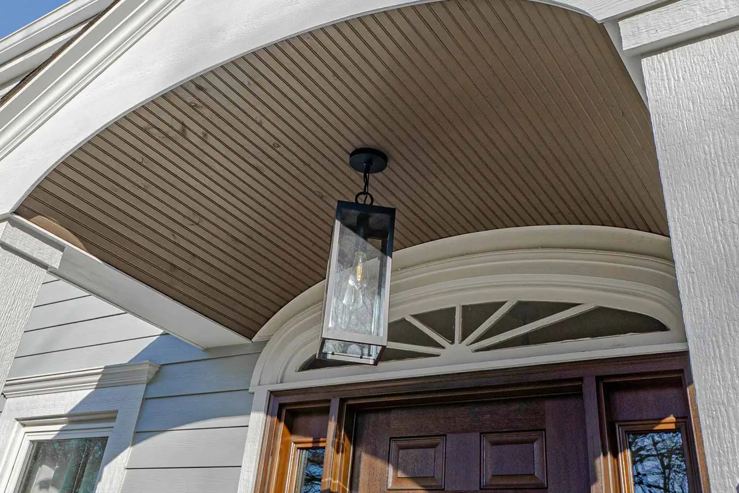 Front porch remodel with bead board ceiling.