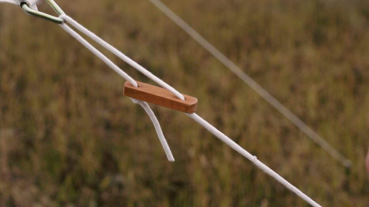 wall tent tensioner