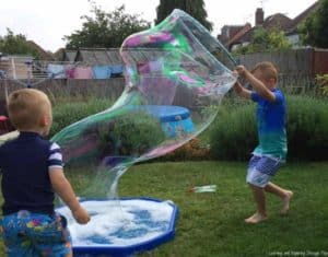 Kids playing with bubbles