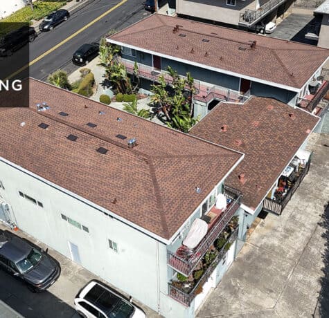 Completed commercial asphalt shingle roof replacement on Carlmont Dr in Belmont by ELM Roofing.