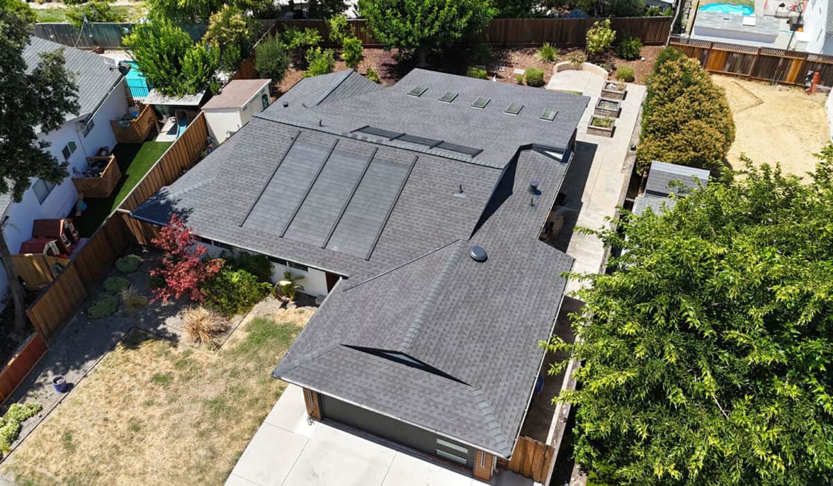 Completed shingle and solar roof installation on Ocho Rios Dr in San Jose by ELM Roofing.