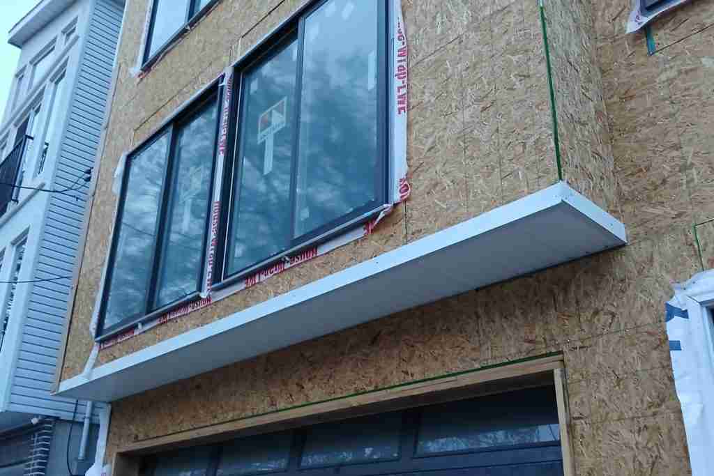 Vinyl siding installation in New Jersey home by ElohCorp Constructs