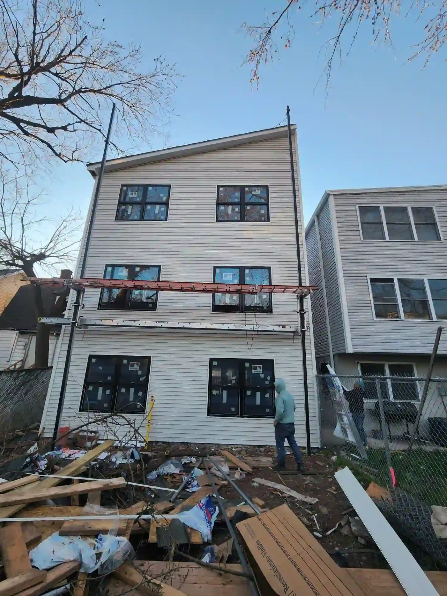 New construction — siding and roofing installation