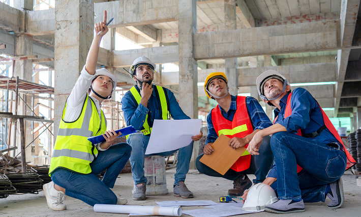Workers inspect the material of infrastructure construction.