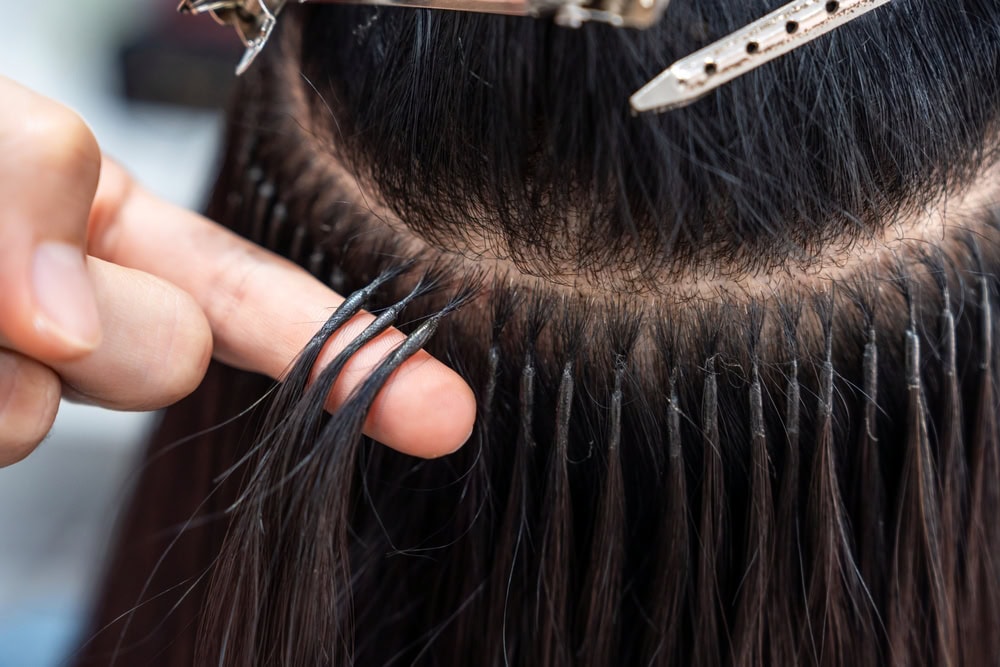 Professional,Female,Hairdresser,Shows,Keratin,Hair,Extensions,Tips,To,Long-haired