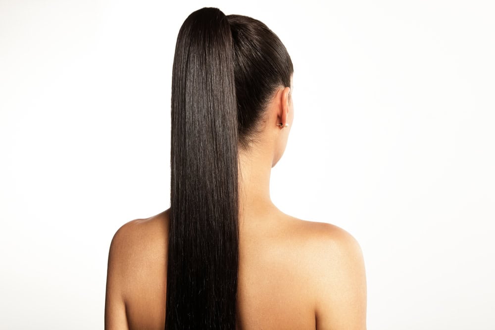 Woman,With,A,Pony,Tail,On,A,White