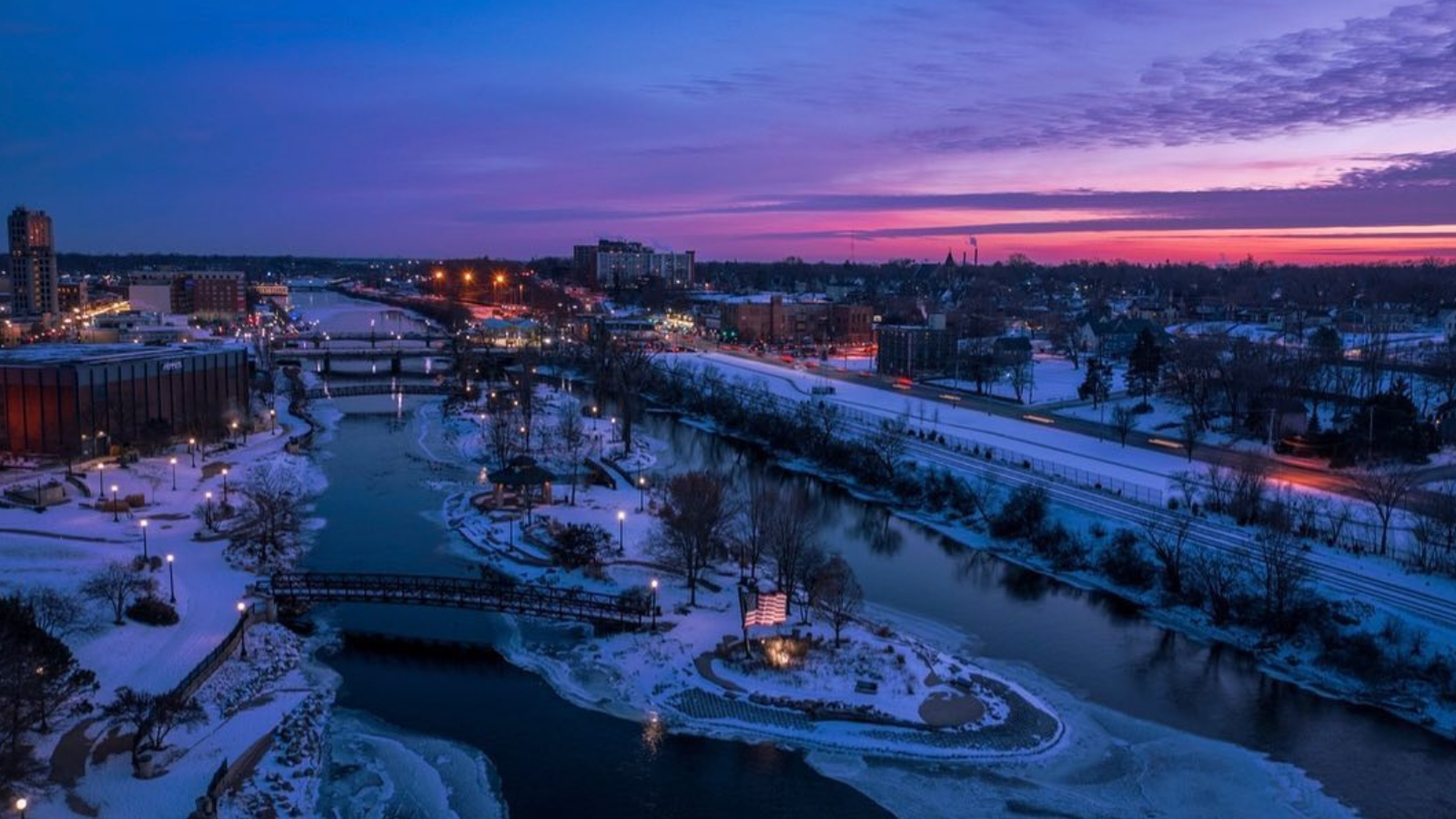 Beautiful Elgin River and city skyline during winter sunset.