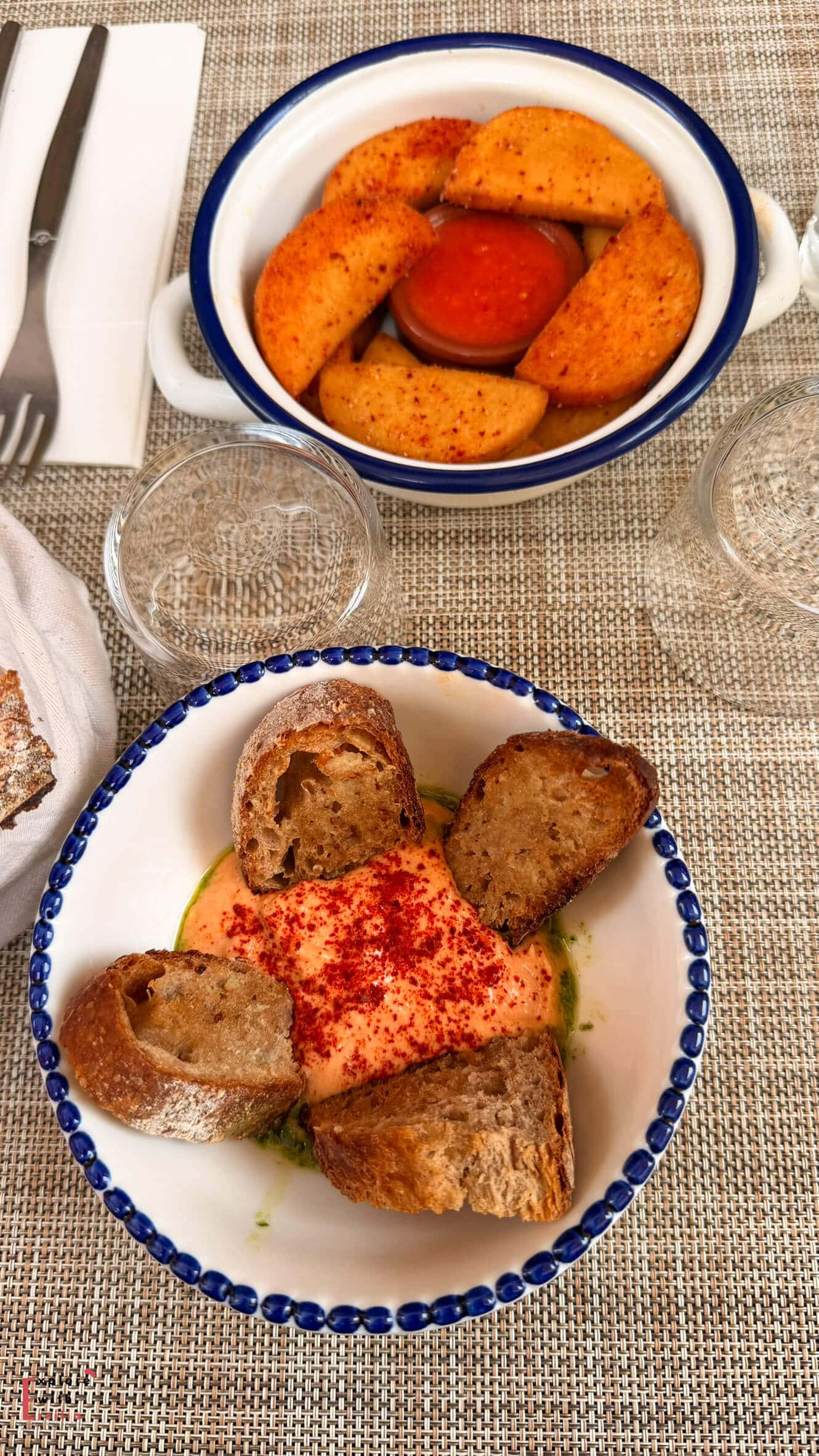 Plate of seafood served at Café Sardine in Cassis with rich sauce and fresh ingredients.
