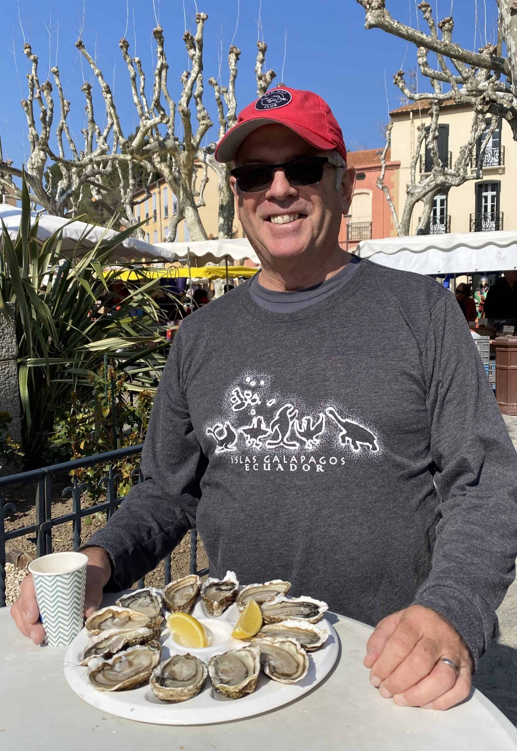 Enjoying fresh oysters at the Collioure market