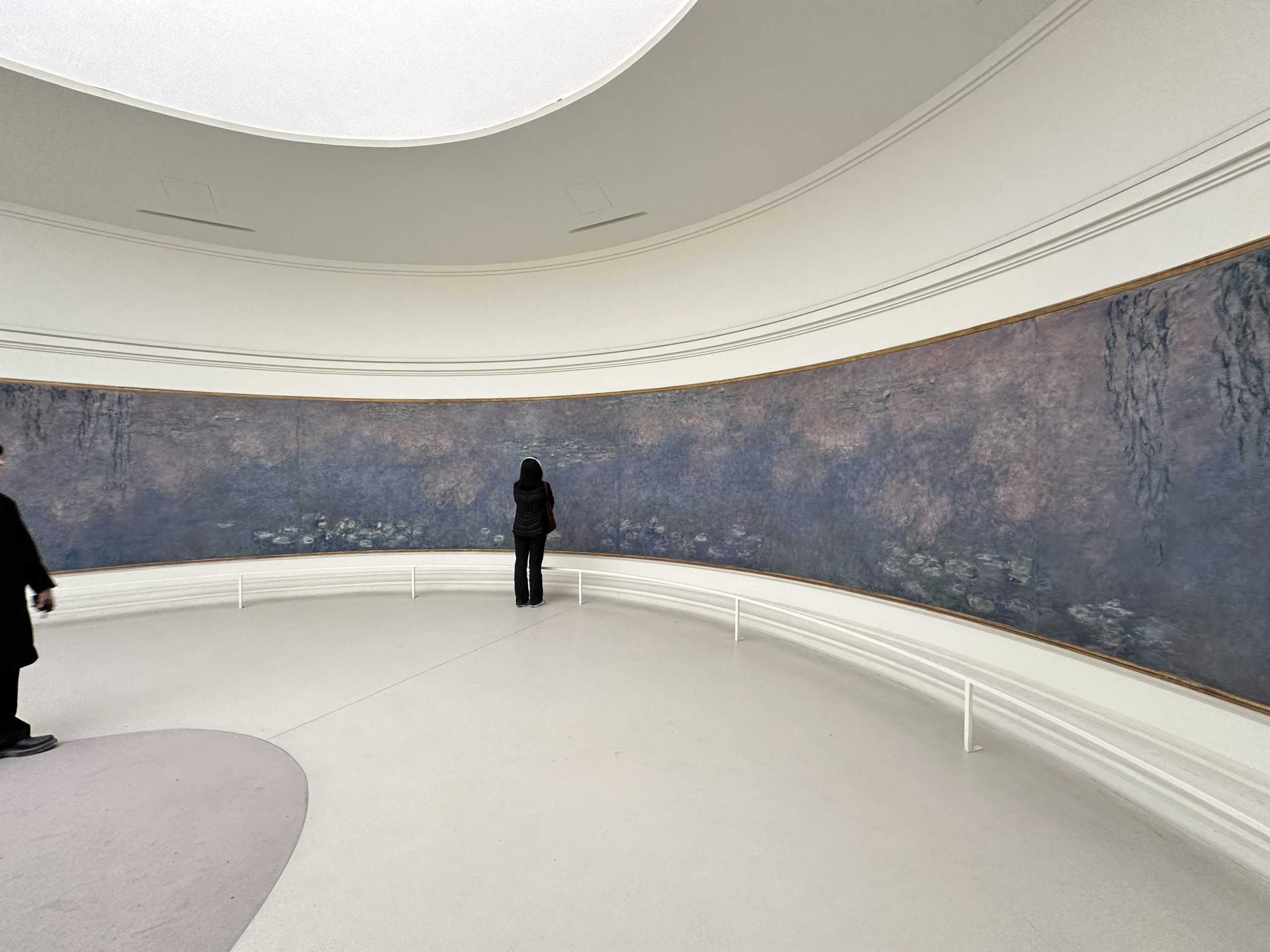 Massive curving Monet painting