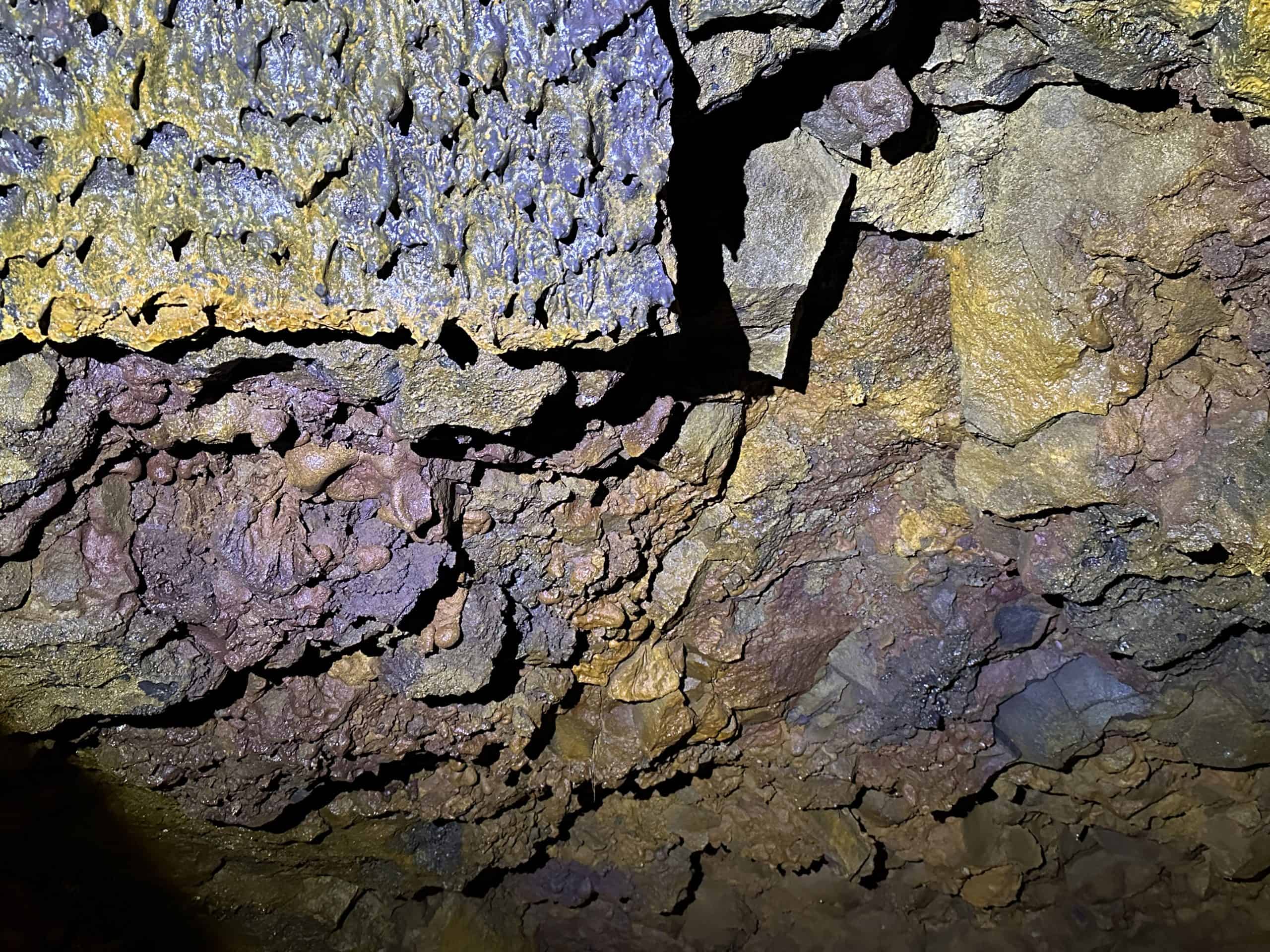 Iron oxide and other minerals in the lava
