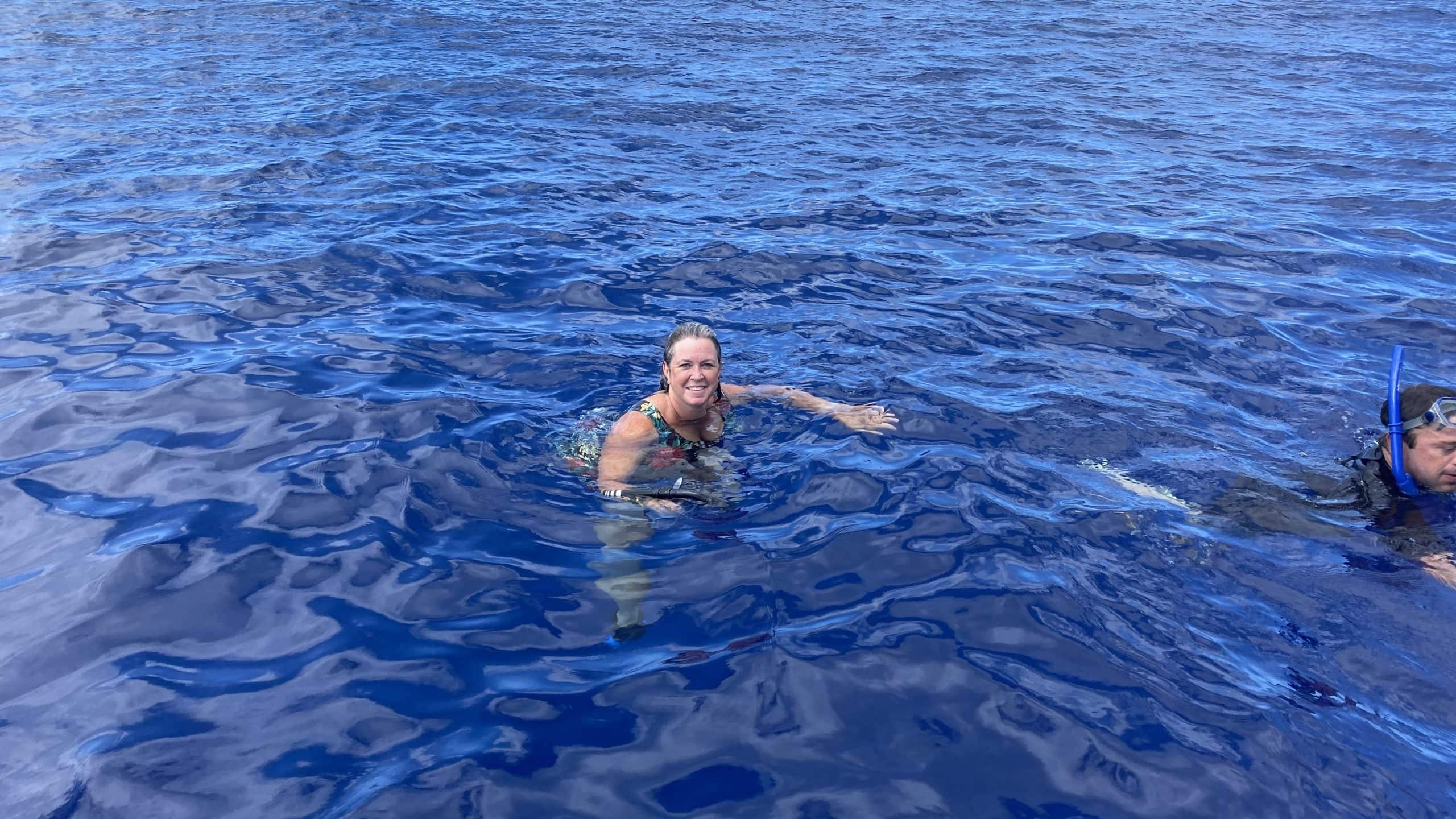 Kim in the water to swim with the whales