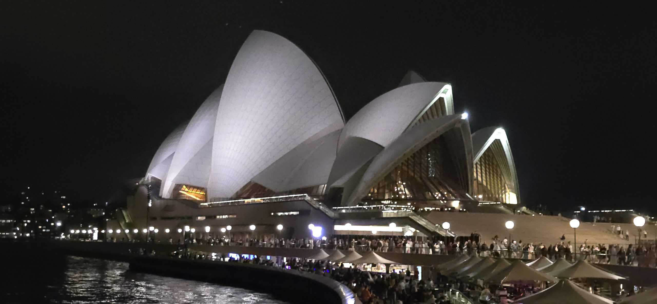 Sydney Opera House lit up at night