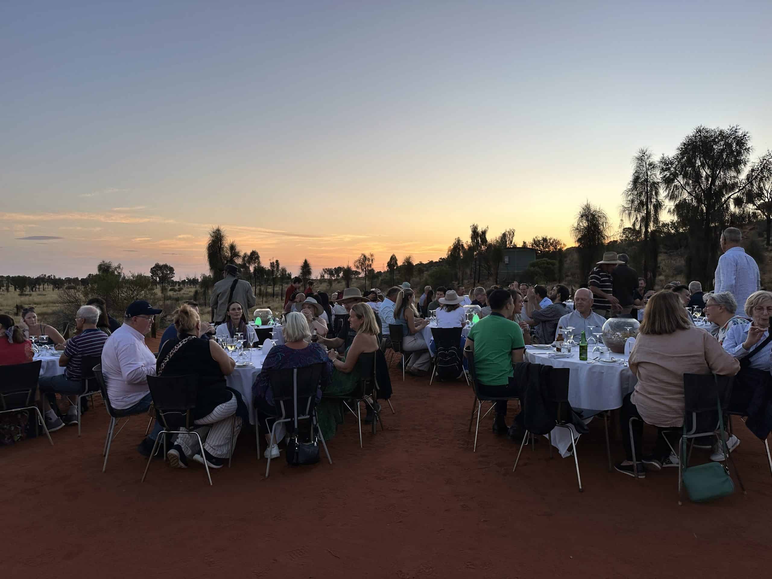 Dinner tables set up under the stars