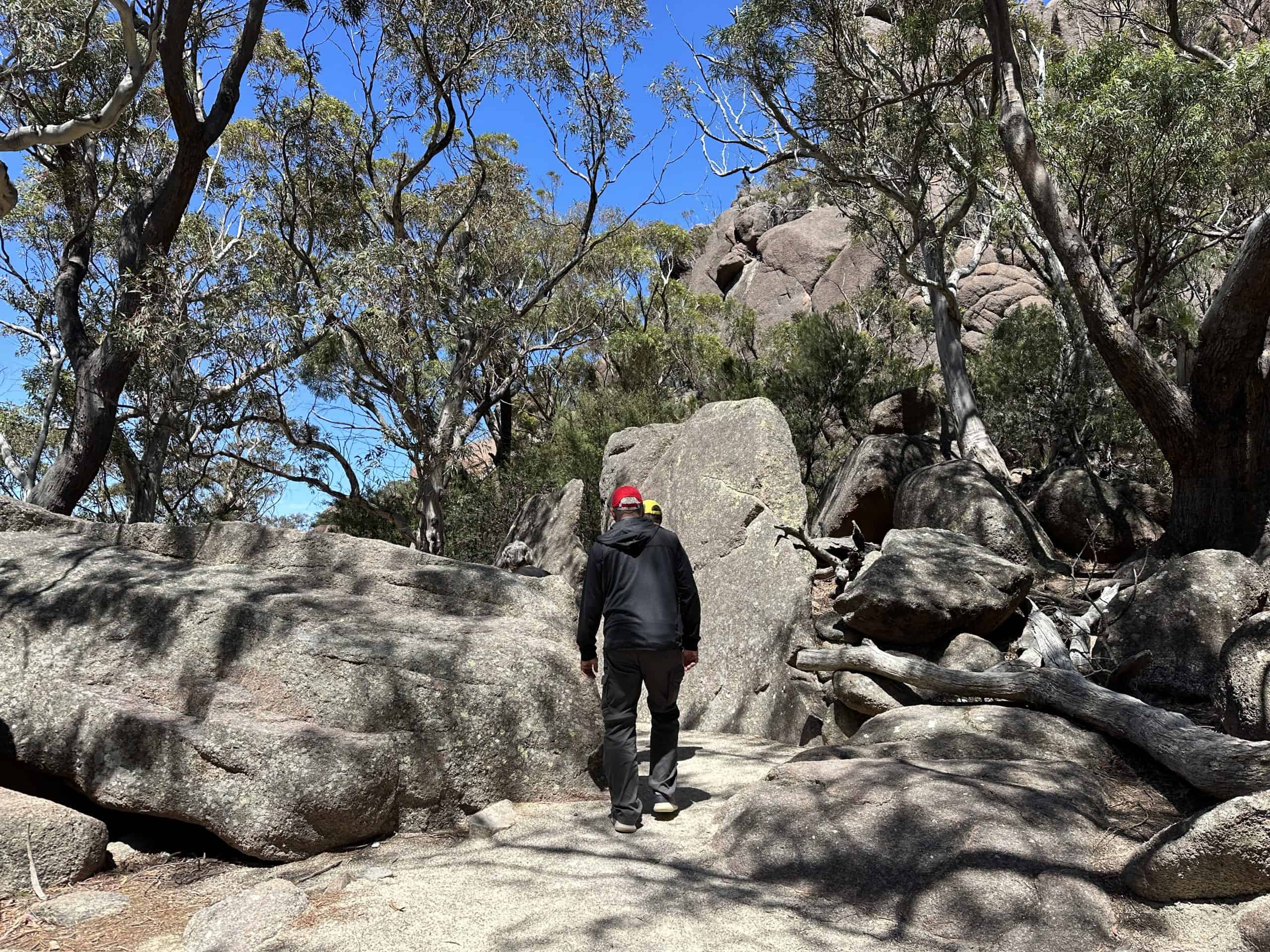 Walking past massive boulders