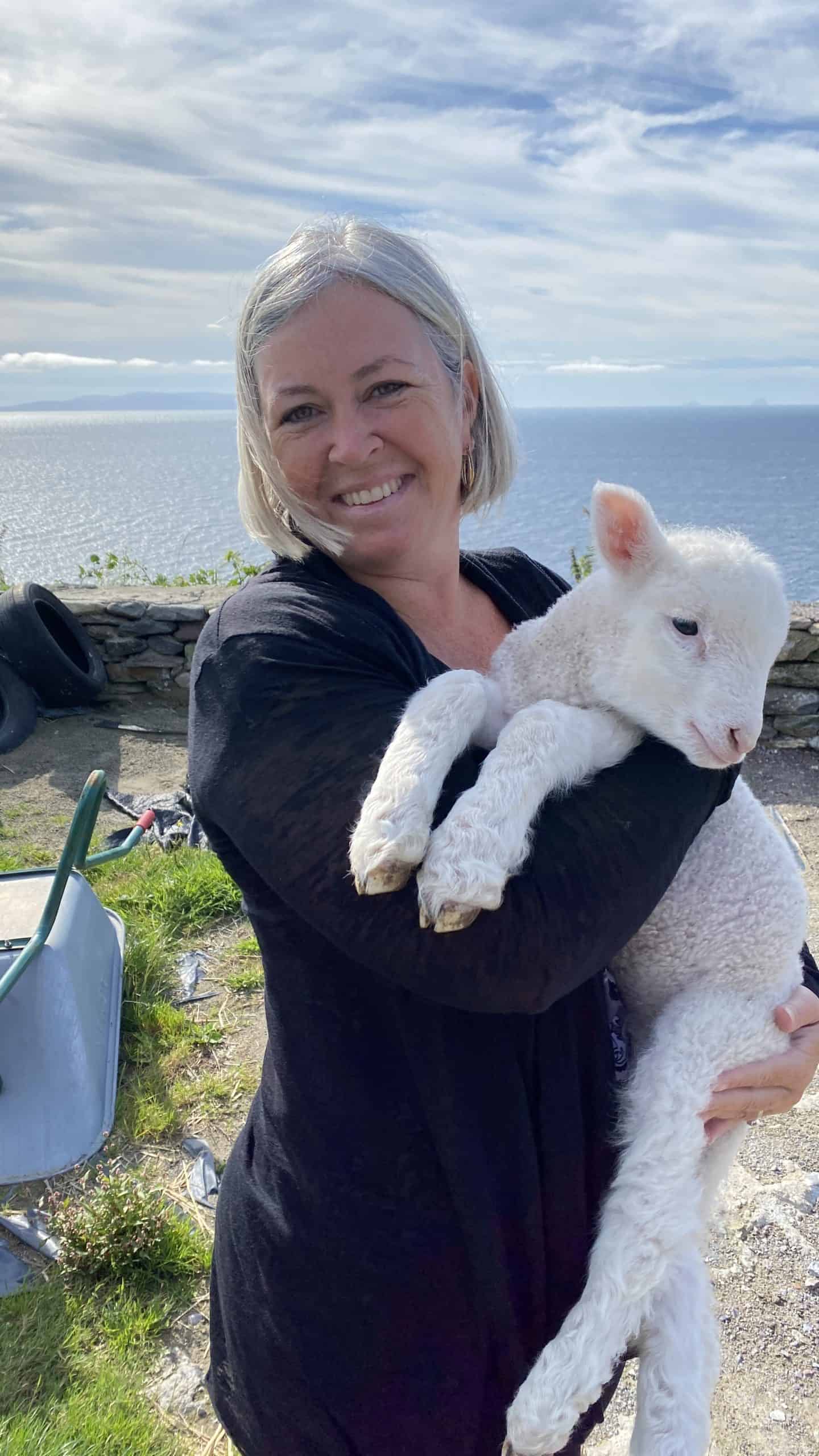 Kim holding a lamb