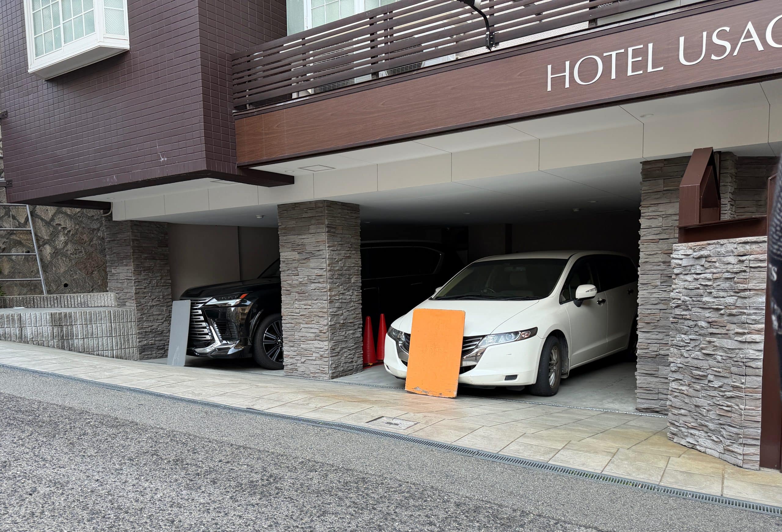 Covered license plates at the Love Hotel
