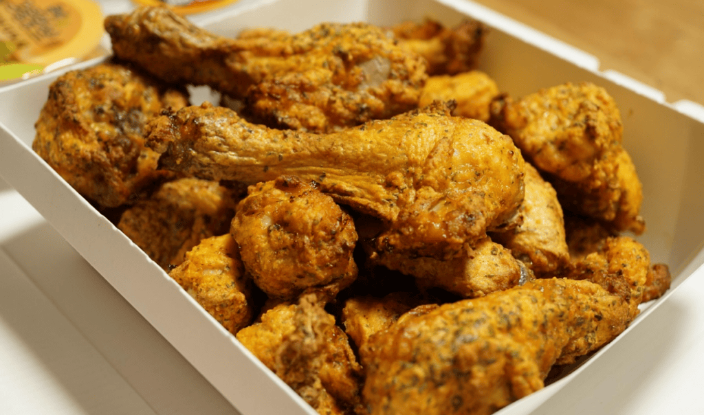 Golden oven-baked Korean chicken with a crispy skin and juicy, tender meat inside.
