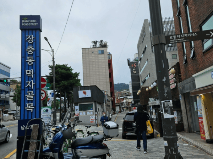 Famous Jangchung-dong Jokbal Street in Seoul, featuring numerous traditional pig's trotter restaurants.