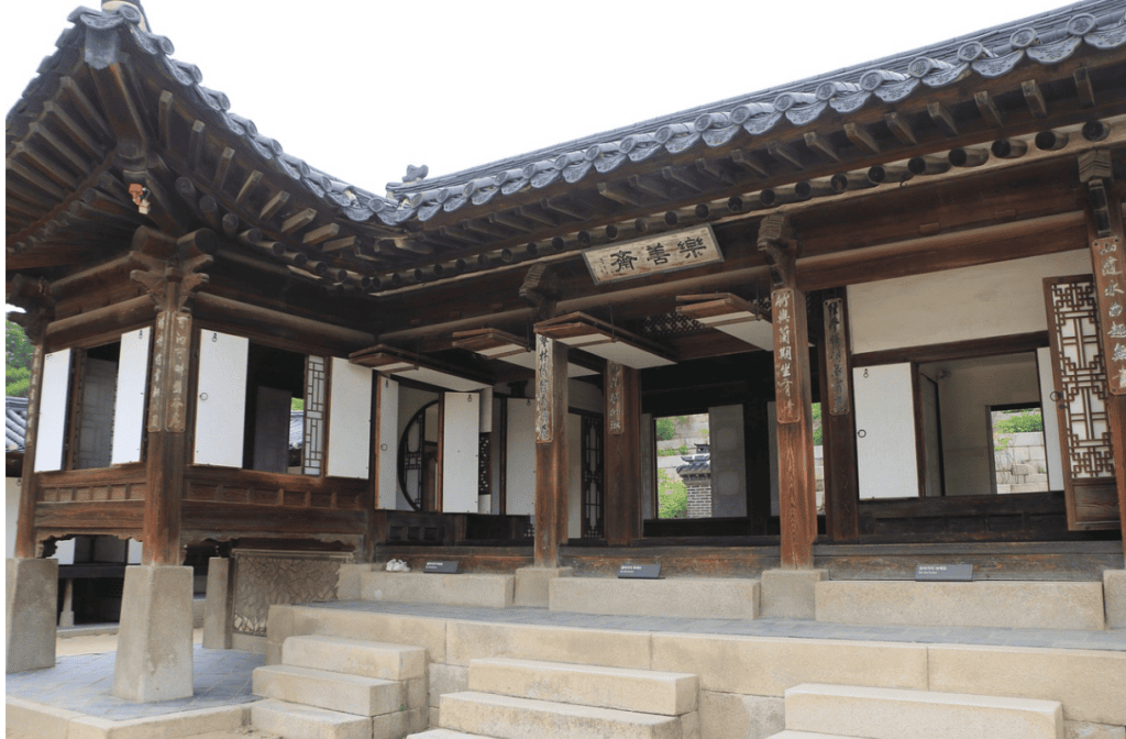 Nakseonjae Hall at Changdeokgung Palace, Seoul. A unique royal residence featuring elegant unpainted wood structures and traditional garden walls. A hidden gem for peaceful walks and cultural exploration in Korea.