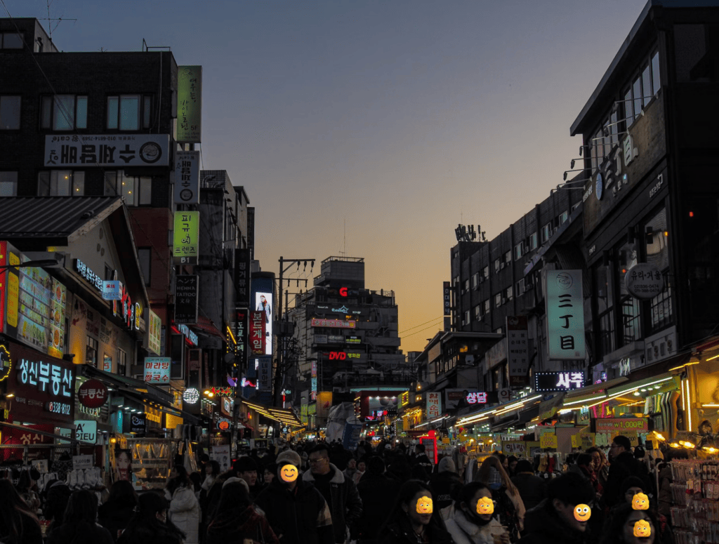 Dazzling neon signs of trendy bars, clubs, and restaurants in Hongdae, capturing the energy of #SeoulNightlife.