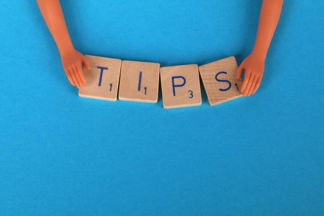 scrabble game tiles that spell out the word tips