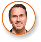 Headshot of Jörg Meyer-Brenken, expert in cannabis lighting technology, suited.