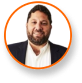 Bearded man in suit, expert in LED grow lights for commercial cannabis lighting.