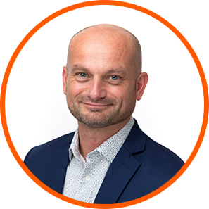 Smiling man in blazer, cannabis lighting expert, LED grow lights for cannabis.