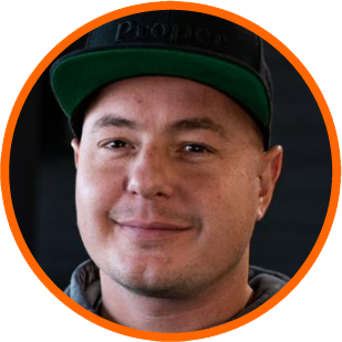 Matt LaBrier, expert in cannabis lighting tech, smiles; orange circle frame.