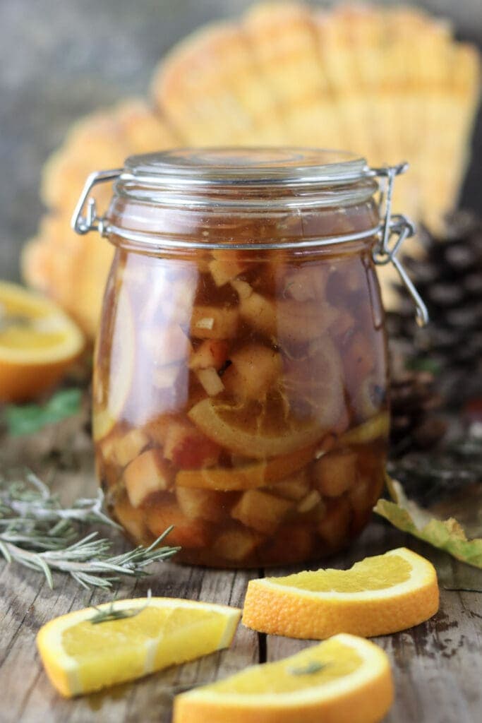 A closed jar of preserved chicken of the woods mushroom as a sweet dessert with spices