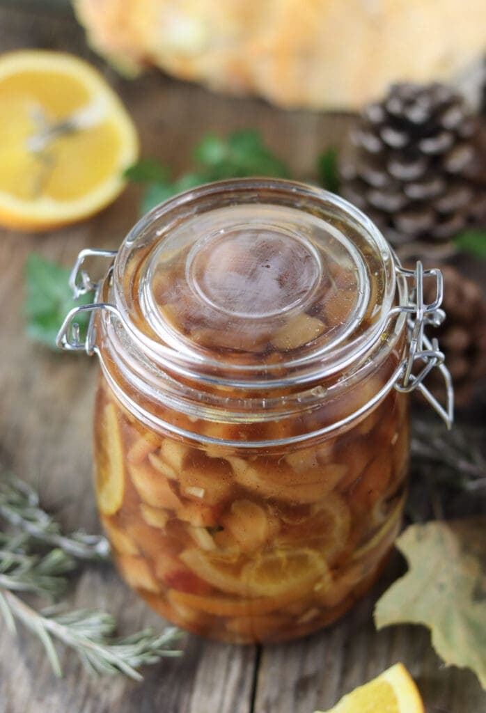 Sweet mushroom dessert with chicken od the woods, lemon, orange and spices in a large glass jar