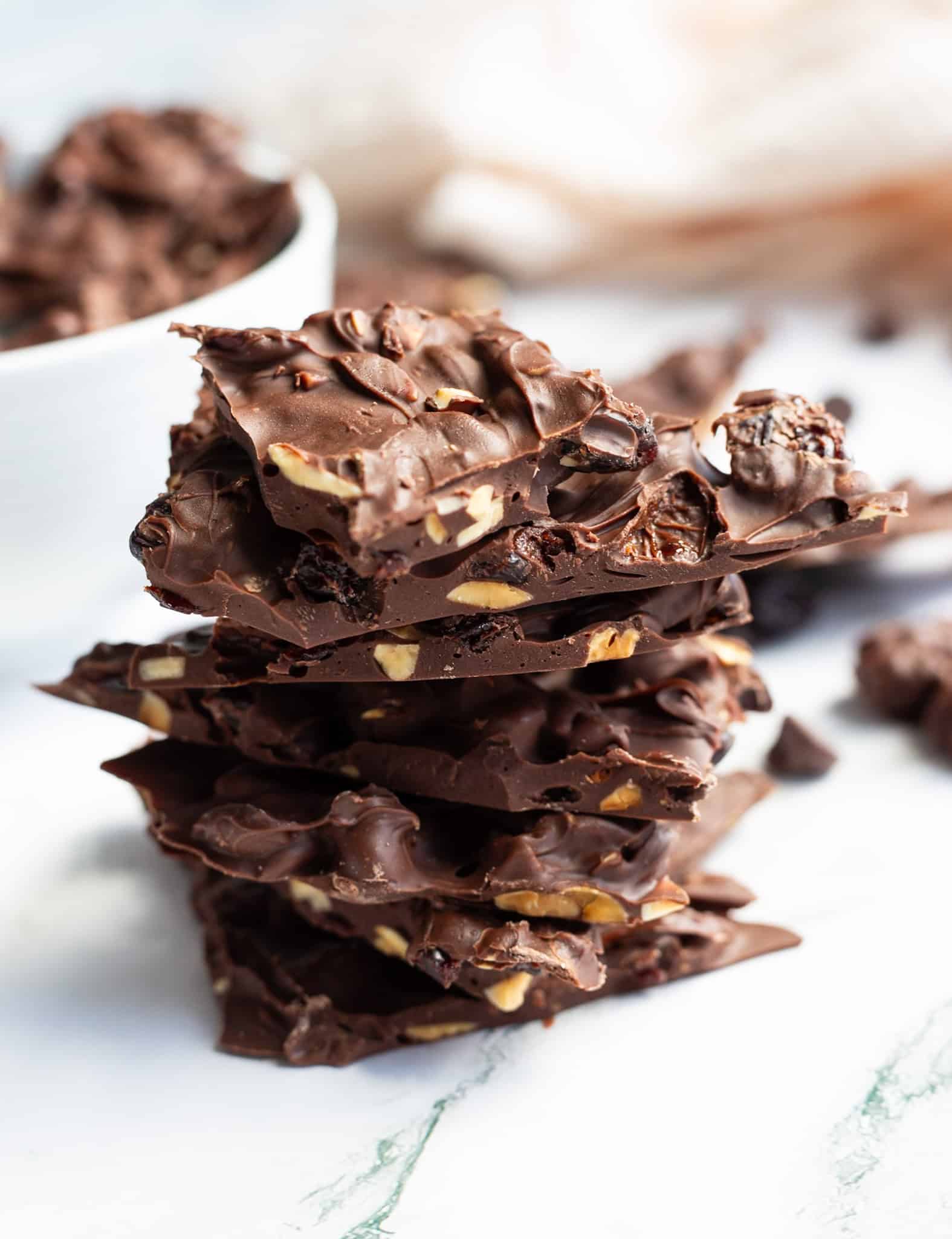 A stack of milk chocolate bark with almonds.