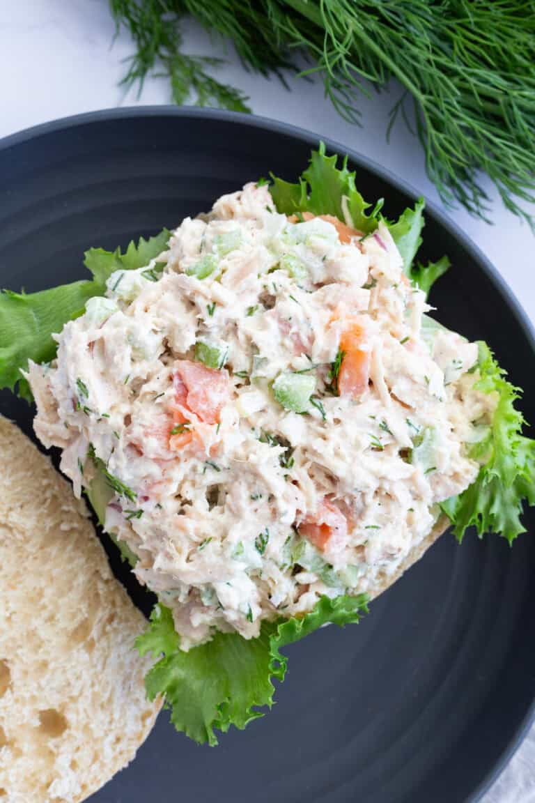 Smoked salmon tuna atop a bottom slice of Ciabatta bread.