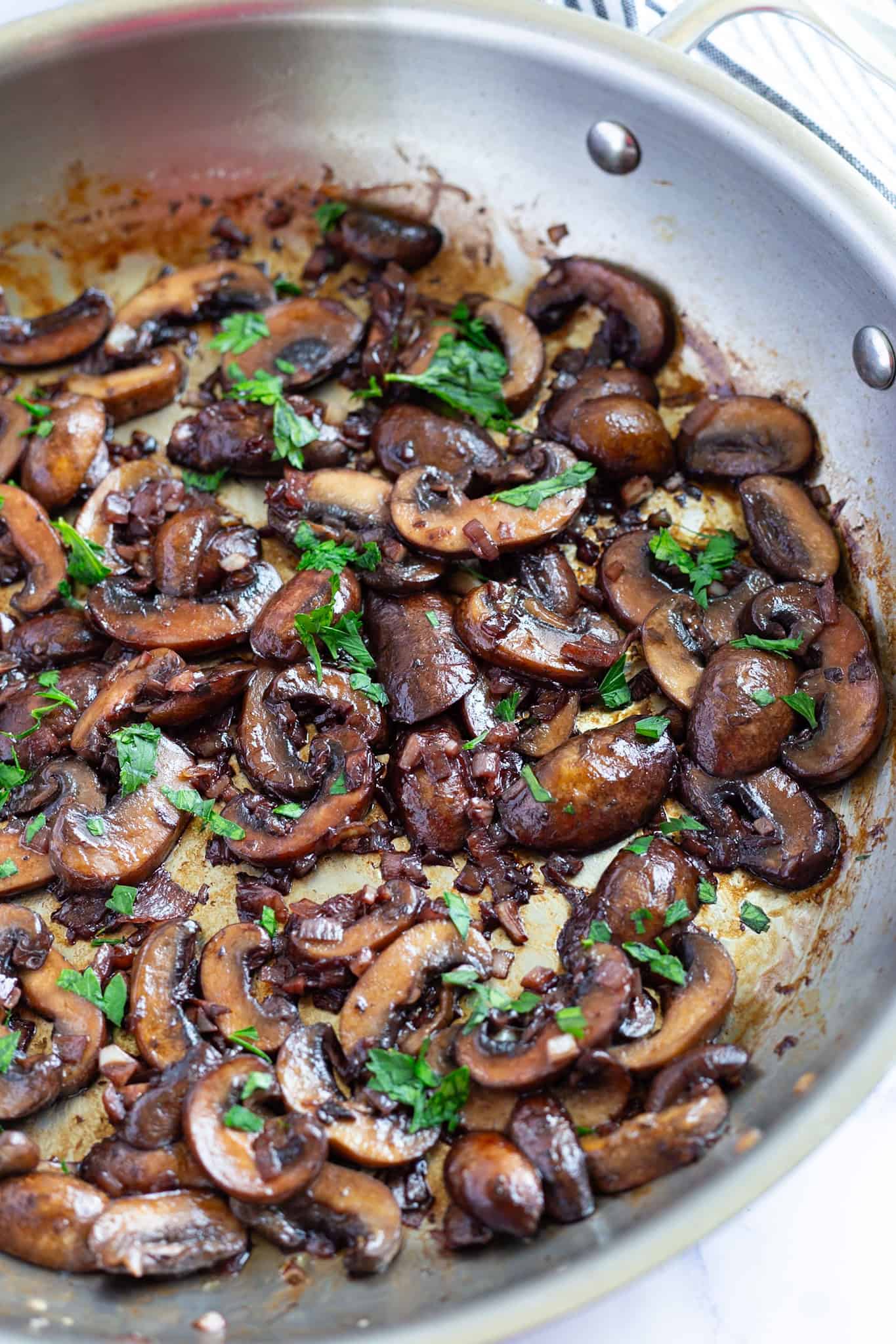 A pan of balsamic red wine mushrooms.