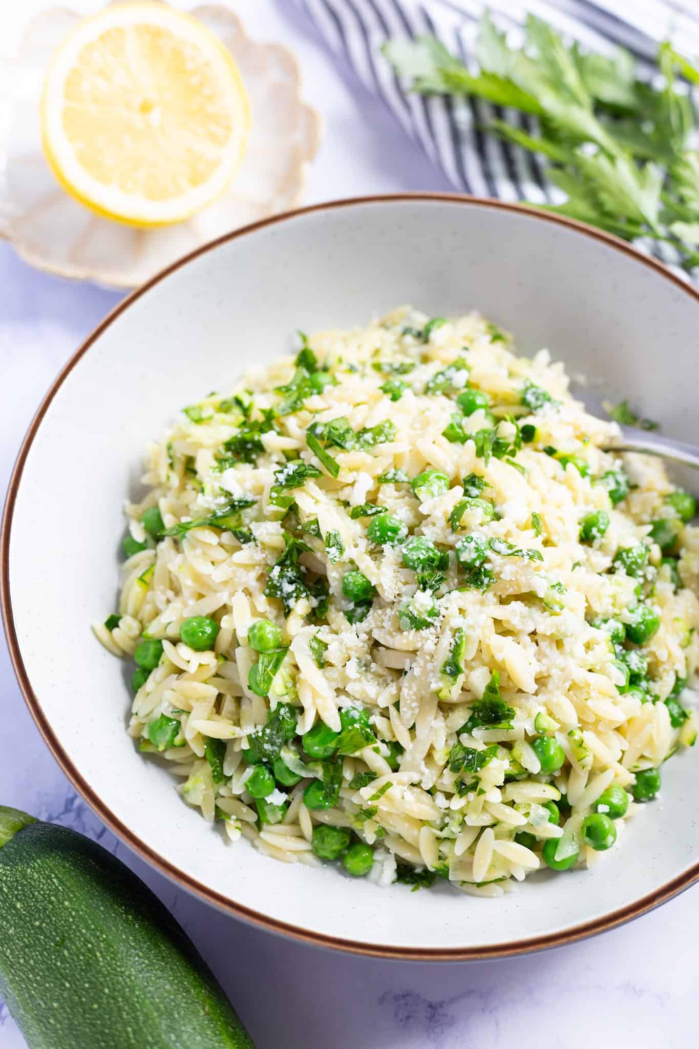 A bowl of summer lemon zucchini orzo.