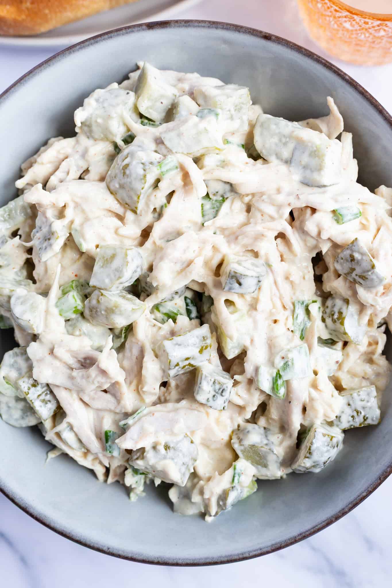 Dill pickle chicken salad in a bowl.