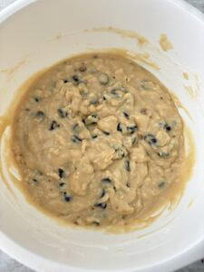 Muffin batter mixed with dry ingredients.