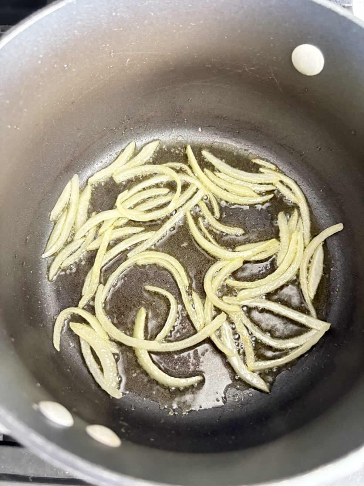 Onions simmered in oil.