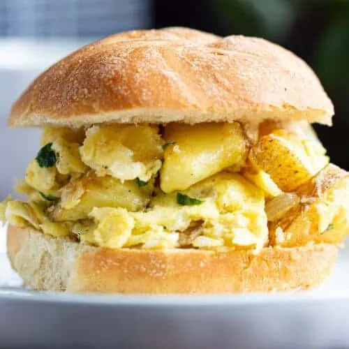 A sandwich roll stuffed with Italian potatoes and eggs.
