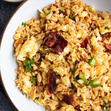 A bowl of bacon and egg fried rice.