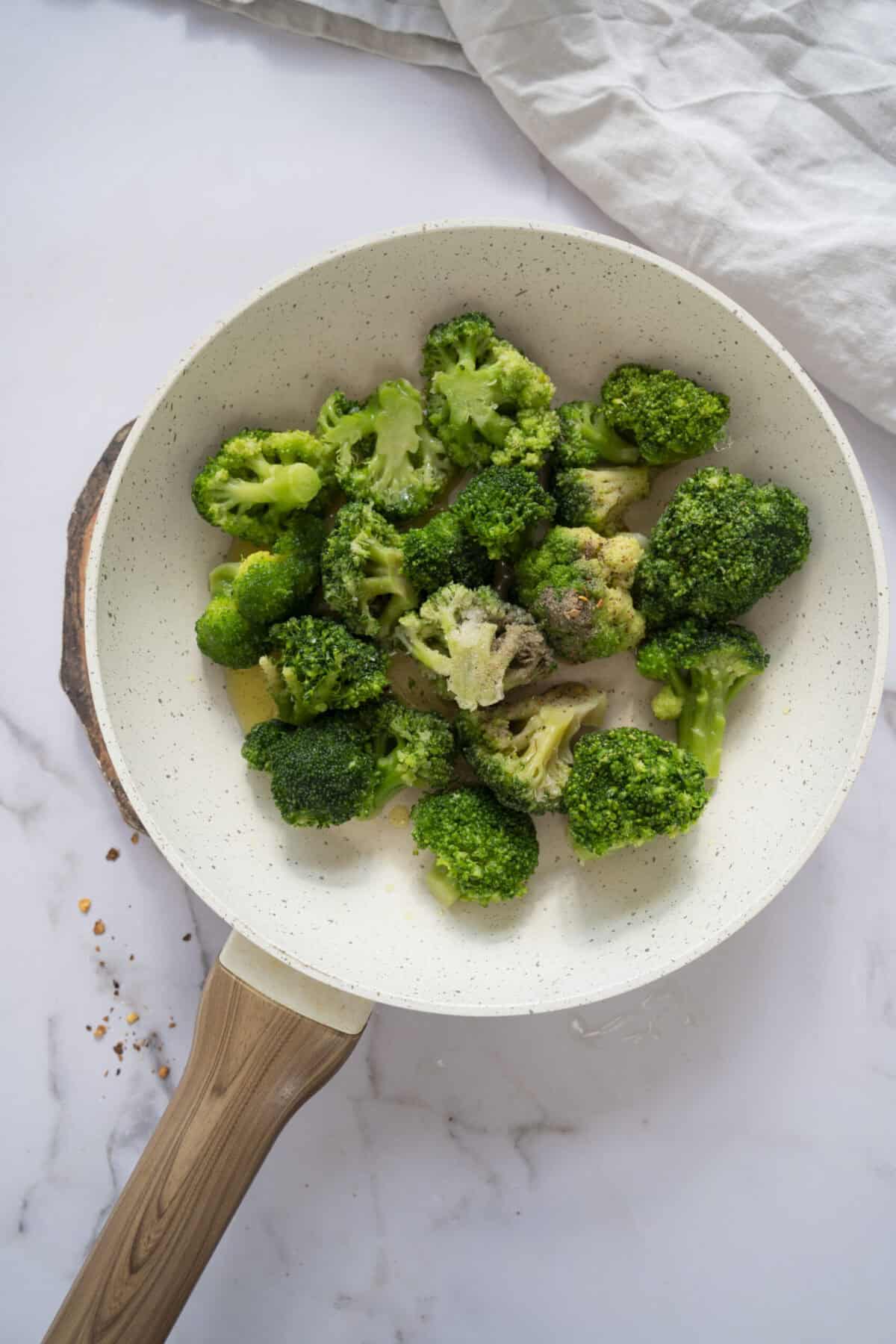 A pan of charred broccoli.